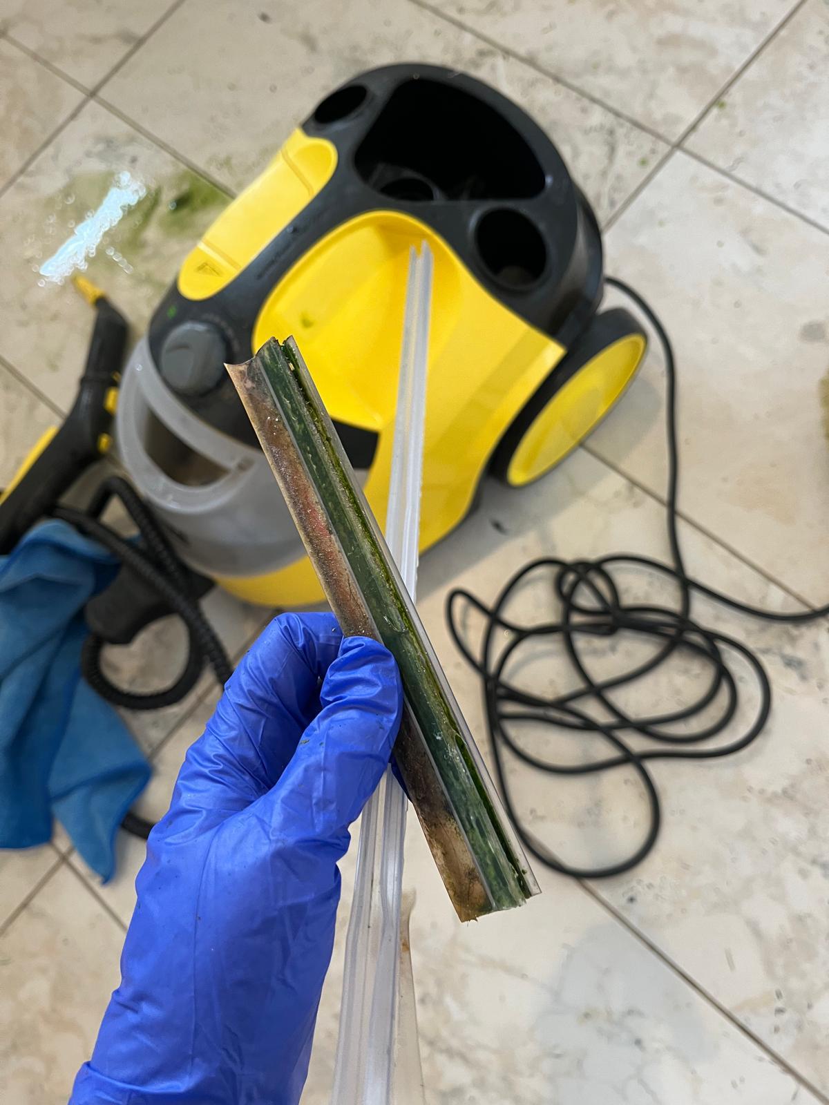 Shower door track before and after